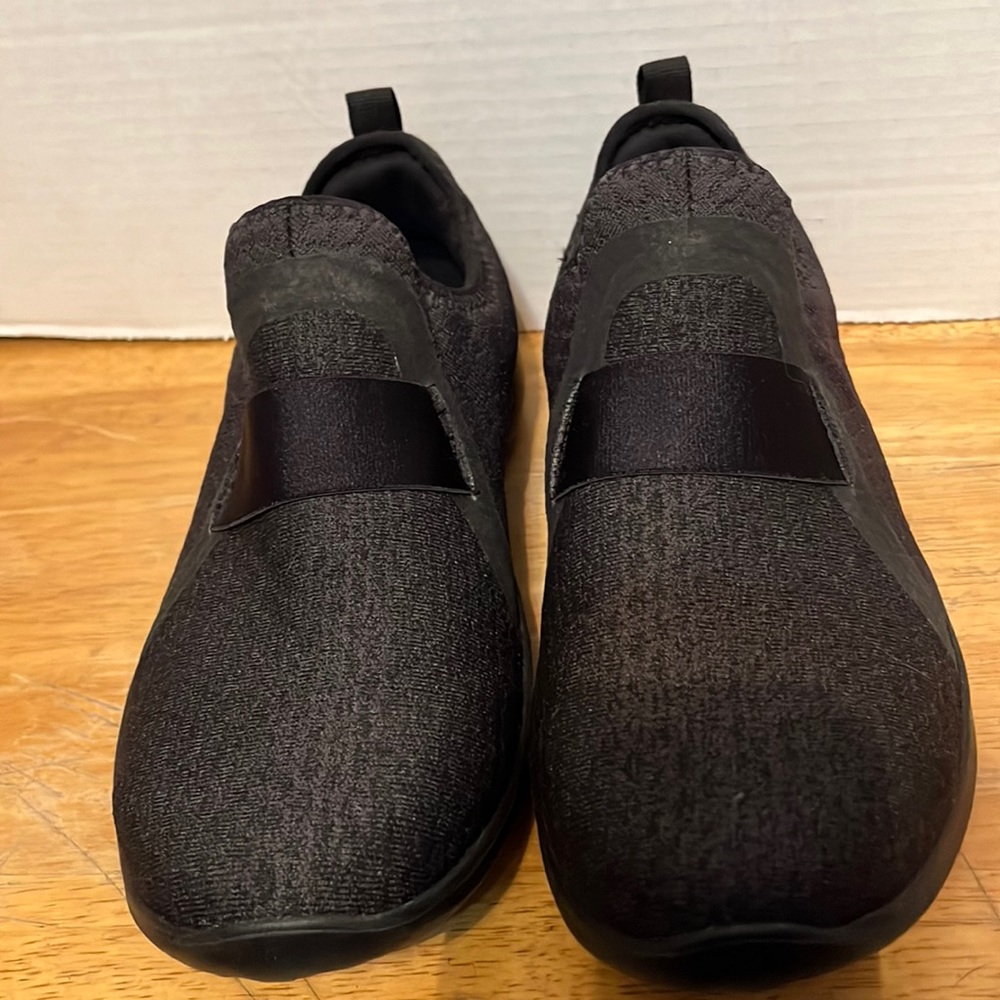Skechers size 8.5 black slip on shoes. Brand new